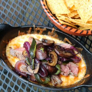 TEC Grills Flank Steak with Cheese Sauce and Rajas