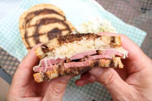 TEC Grills Pastrami - Pastrami Reuben Sandwich in Hands