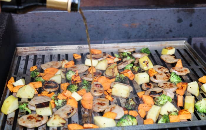 TEC Grills One Grill Pan Suppers - Pouring Balsamic Vinegar over the Food on the Grill